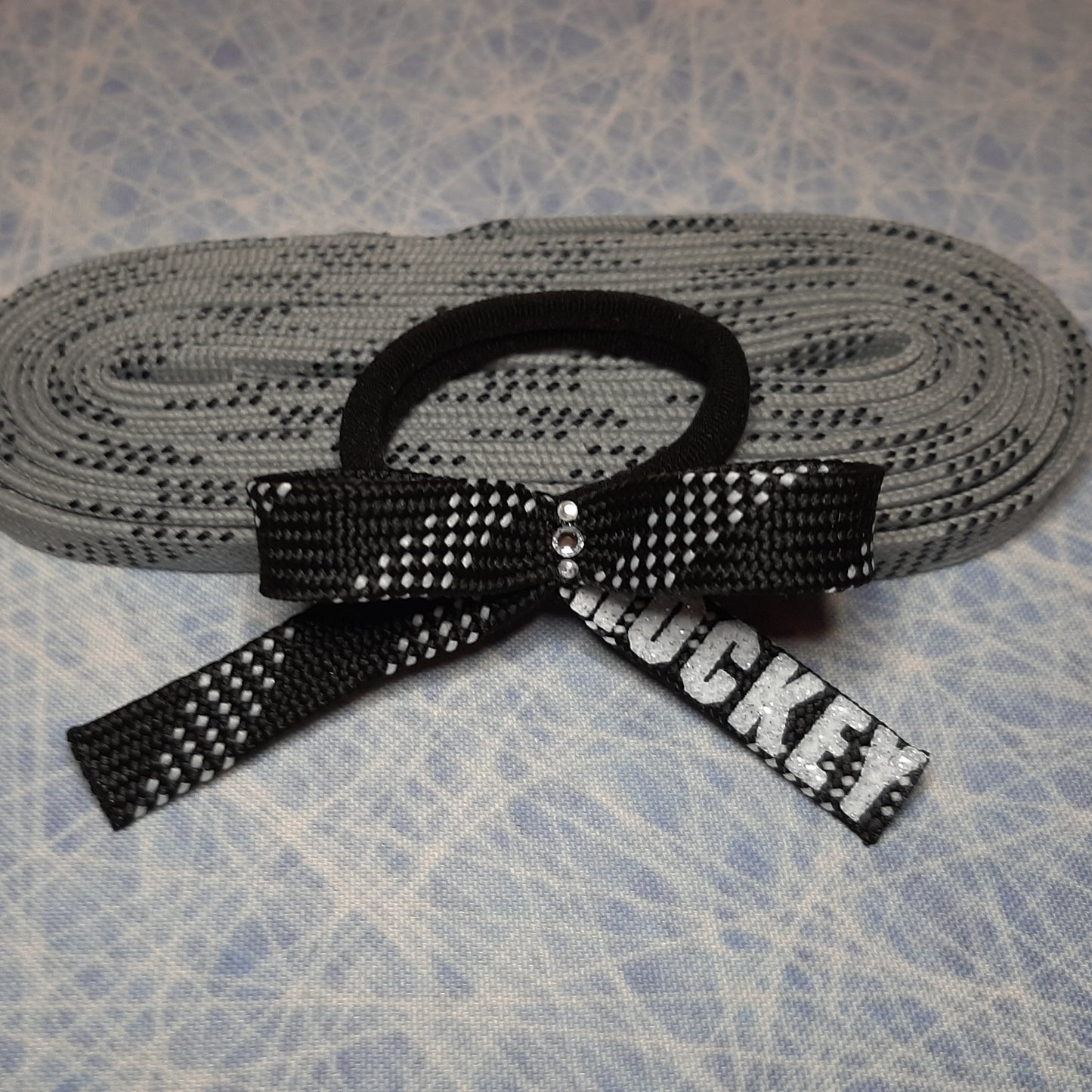 Élastique à cheveux - Hockey sur lacet