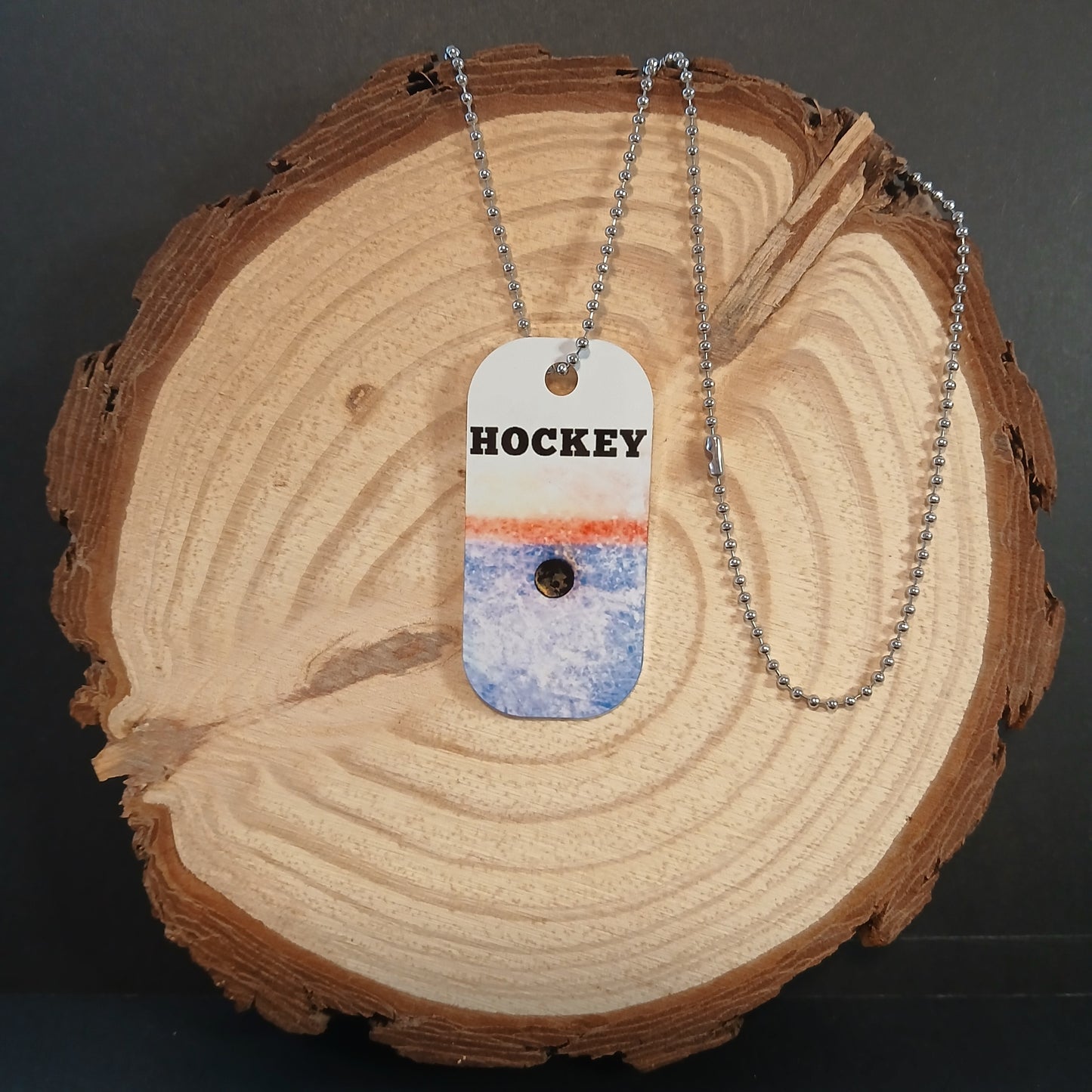 Insigne - Rondelle sur glace
